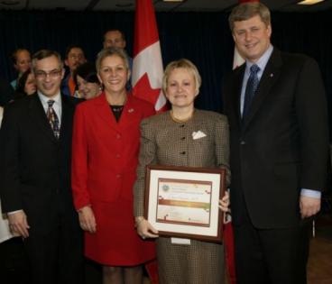 Janet Bryanton Receives National Award: From left Tony Clement; Federal Minister of Health, Marlene Smadu; President of CNA, Janet Bryanton and Prime Minister Stephen Harper.